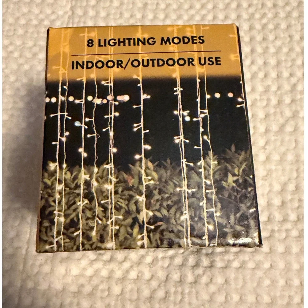 Twinkle Star 300 LED Curtain Lights Warm White Indoor Outdoor 8 Modes 6.6x9.8ft
